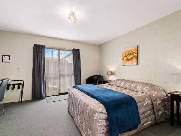 Econo Lodge Canterbury Court Motel : photo 1 de la chambre chambre lit queen-size