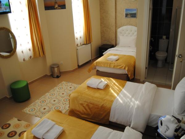 Lotus Hotel : photo 2 de la chambre chambre quadruple standard