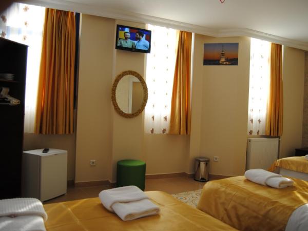 Lotus Hotel : photo 6 de la chambre chambre quadruple standard