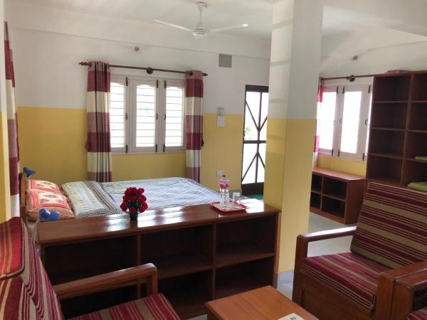 Happy Sedi Lodge : photo 1 de la chambre suite lit king-size avec balcon