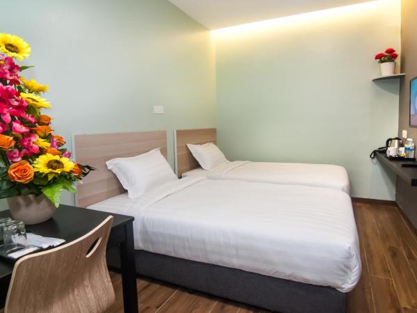 GOOD 9 HOTEL - Bukit Dahlia : photo 1 de la chambre chambre lits jumeaux supérieure