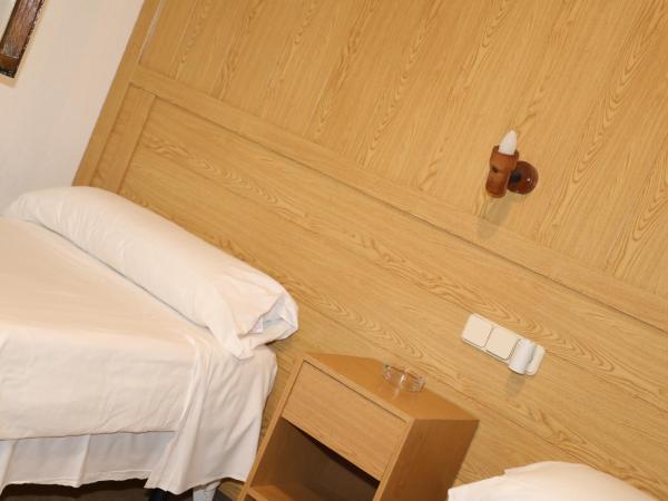 Hostal El Descanso : photo 2 de la chambre chambre lits jumeaux