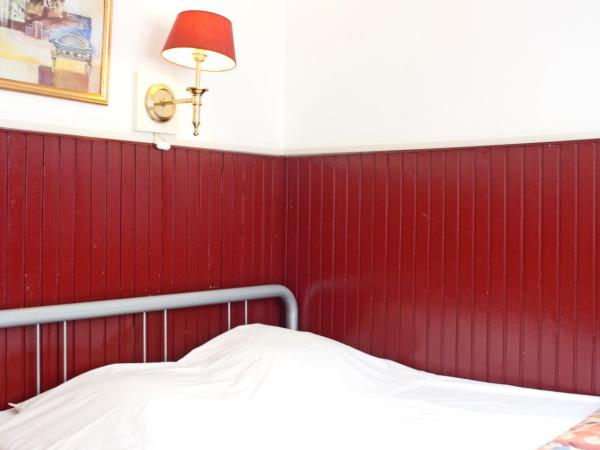 De Mallemoolen : photo 1 de la chambre chambre simple basique avec salle de bains commune 