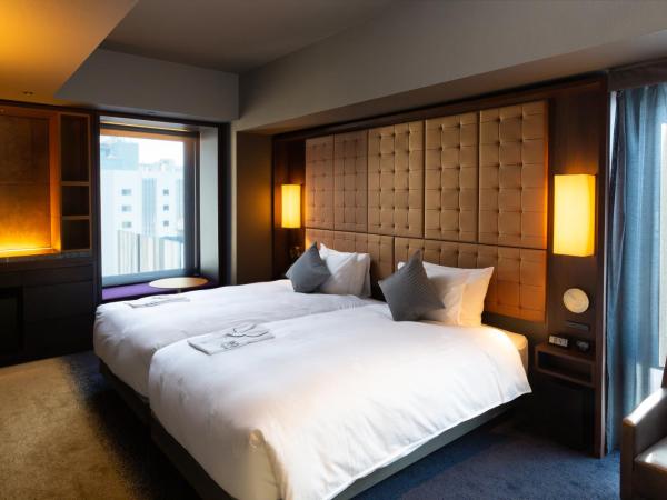 The Royal Park Canvas - Ginza 8 : photo 1 de la chambre chambre lits jumeaux deluxe