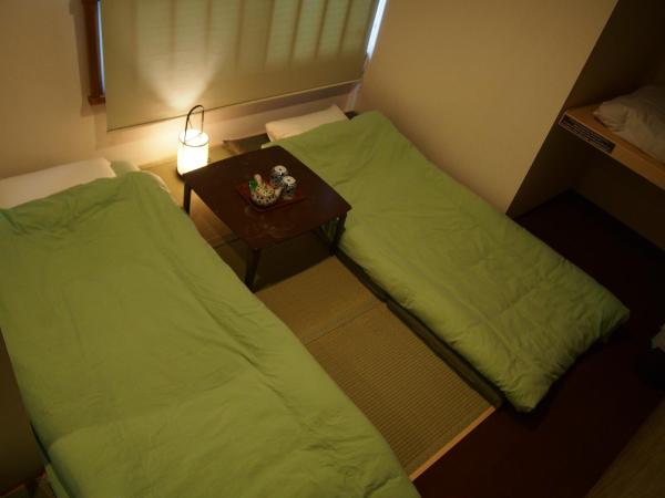 Guesthouse Soi : photo 9 de la chambre chambre triple de style japonais avec salle de bains commune