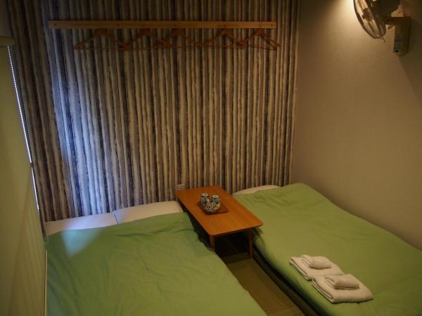 Guesthouse Soi : photo 2 de la chambre chambre lits jumeaux avec salle de bains commune