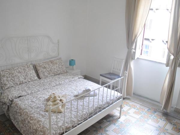 Sunrise Hostel & Rooms : photo 5 de la chambre chambre quadruple avec salle de bains commune