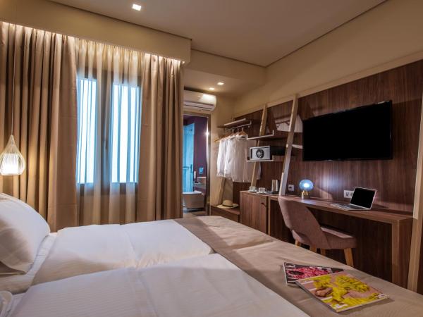 Metropole Urban Hotel : photo 2 de la chambre chambre Économique