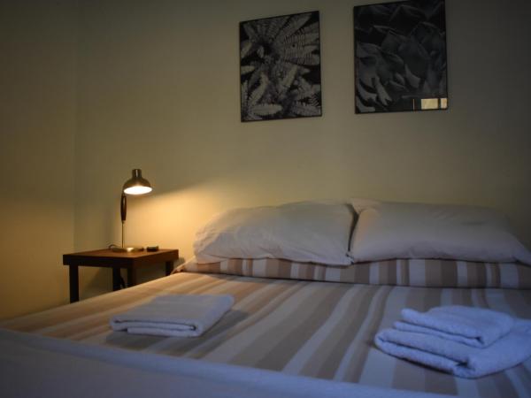 BA STOP Hostel : photo 8 de la chambre chambre triple avec salle de bains privative