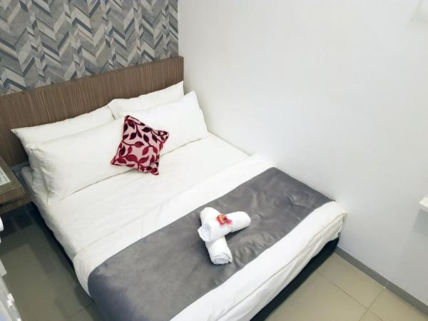 Teruntum 96 Guest house : photo 2 de la chambre chambre standard lit queen-size