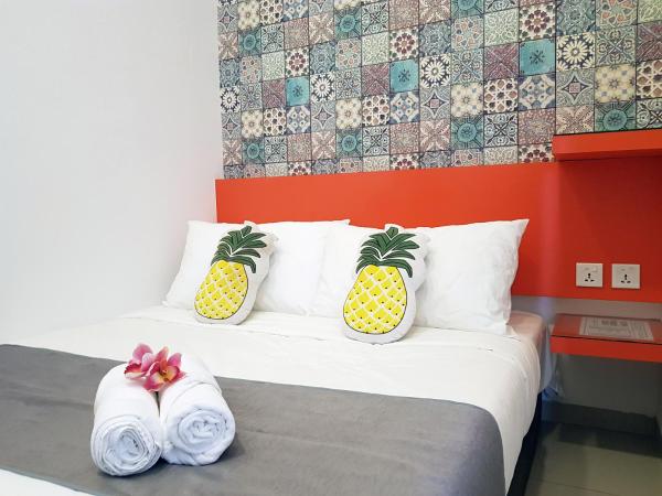 Teruntum 96 Guest house : photo 1 de la chambre chambre standard lit queen-size