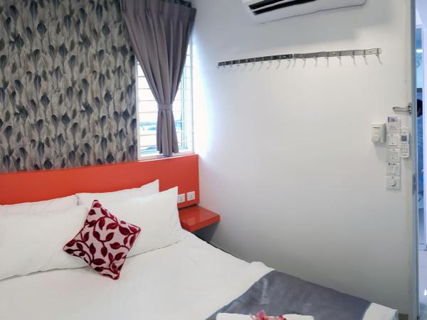 Teruntum 96 Guest house : photo 2 de la chambre chambre lit queen-size deluxe