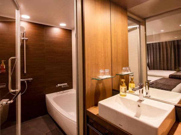 karaksa hotel grande Shin-Osaka Tower : photo 3 de la chambre chambre lits jumeaux premier - Étage supérieur