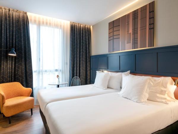 Vincci Consulado de Bilbao : photo 1 de la chambre chambre double ou lits jumeaux - vue sur rivière