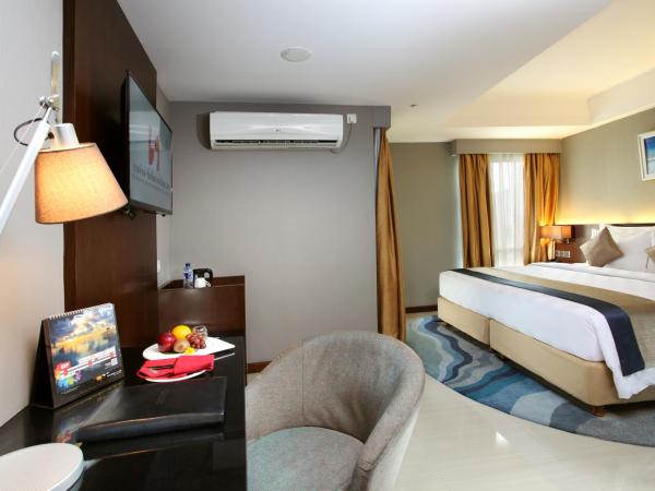 Swiss-Belresidences Rasuna Epicentrum : photo 1 de la chambre chambre lit queen-size deluxe