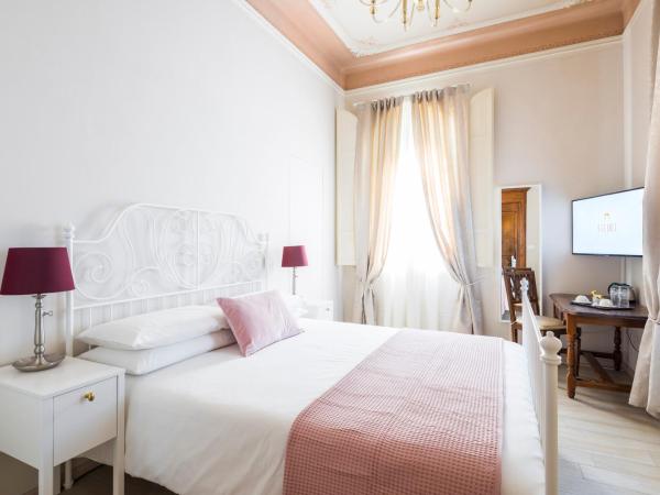 Villa Savioli Room & Breakfast : photo 1 de la chambre chambre supérieure lit queen-size
