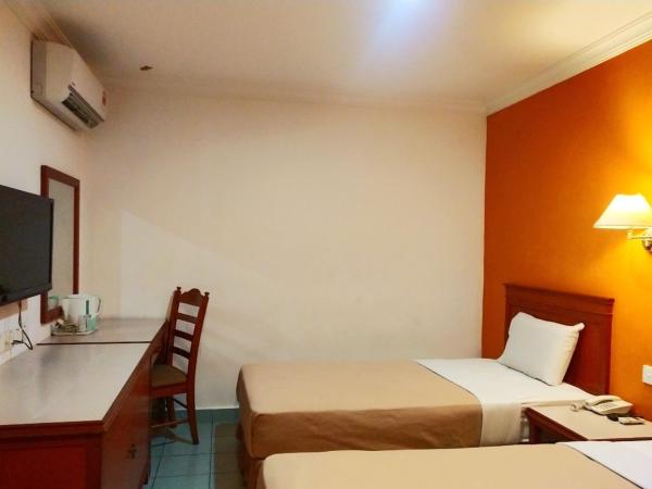 Megah Inn : photo 1 de la chambre chambre lits jumeaux standard