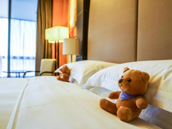 Hyatt Regency Dongguan : photo 3 de la chambre chambre lit king-size - accès au club