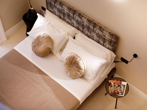 MelRose Napoli : photo 5 de la chambre chambre triple Économique avec balcon