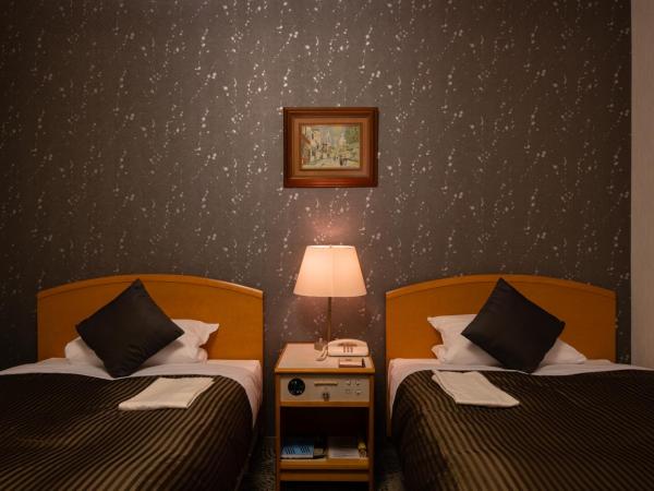 Hotel Okura Niigata : photo 4 de la chambre chambre lits jumeaux standard - fumeurs