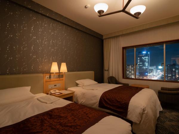 Hotel Okura Niigata : photo 1 de la chambre chambre lits jumeaux deluxe - vue sur rivière - non-fumeurs