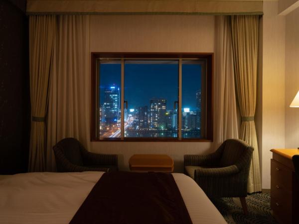 Hotel Okura Niigata : photo 3 de la chambre chambre lits jumeaux deluxe - vue sur rivière - non-fumeurs