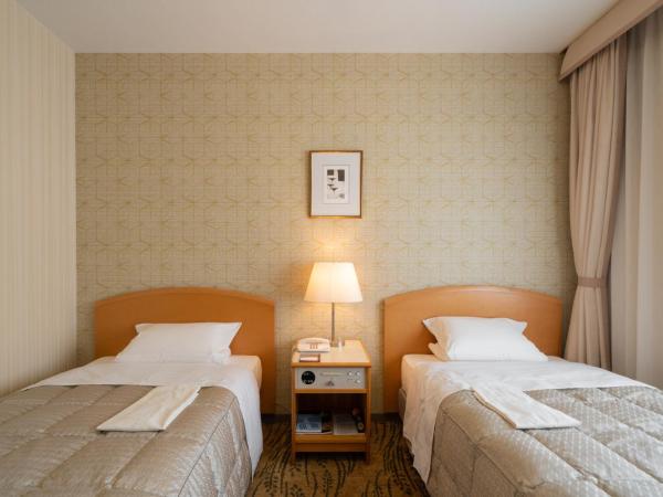 Hotel Okura Niigata : photo 2 de la chambre chambre lits jumeaux Économique - non-fumeurs