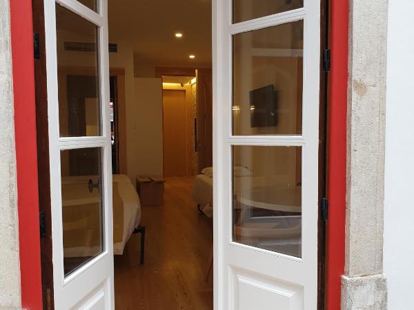 Casa da Baixa Downtown House : photo 2 de la chambre chambre familiale avec balcon