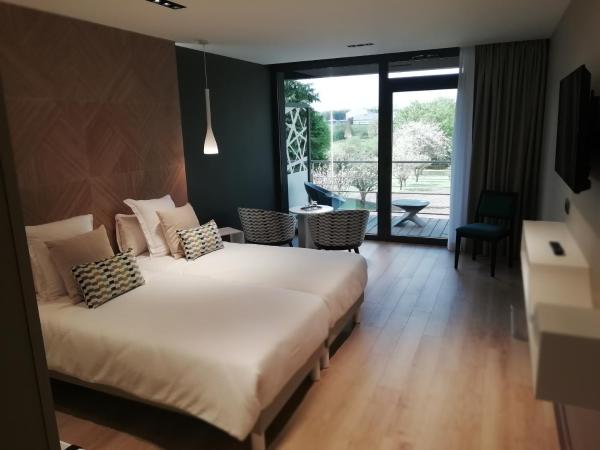 Domaine de Bayeux : photo 6 de la chambre chambre double - extension dans verger