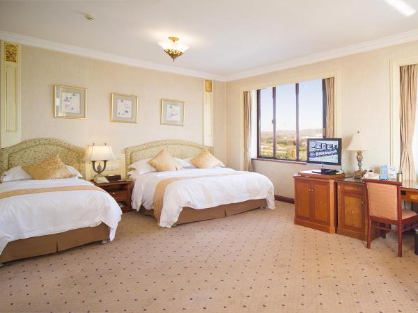 Huiquan Dynasty Hotel Qingdao : photo 3 de la chambre chambre familiale