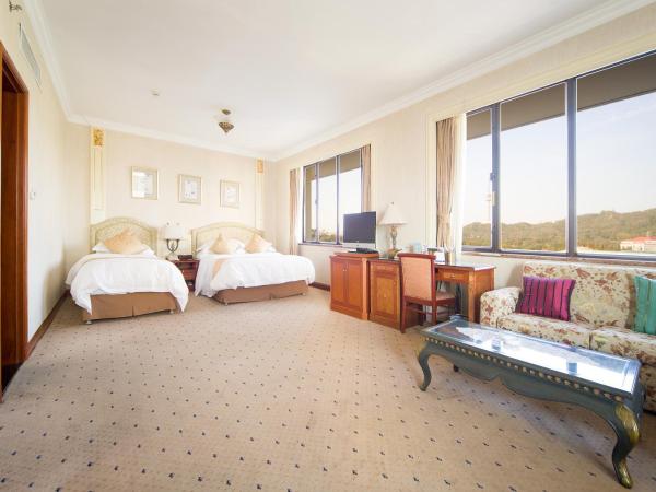 Huiquan Dynasty Hotel Qingdao : photo 2 de la chambre chambre familiale