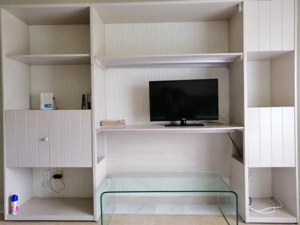 Beachfront Getaway Condo : photo 1 de la chambre appartement - vue sur jardin