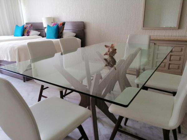 Beachfront Getaway Condo : photo 2 de la chambre appartement - vue sur jardin