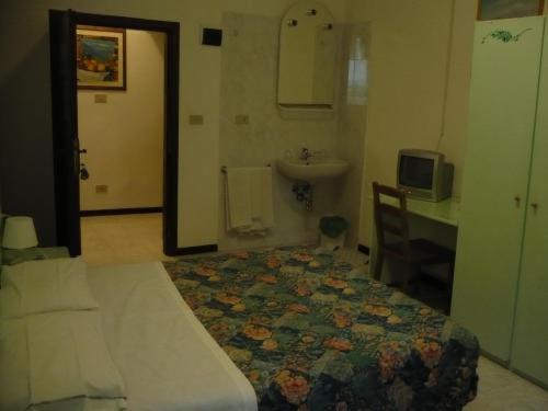 Hotel Adua : photo 2 de la chambre chambre triple