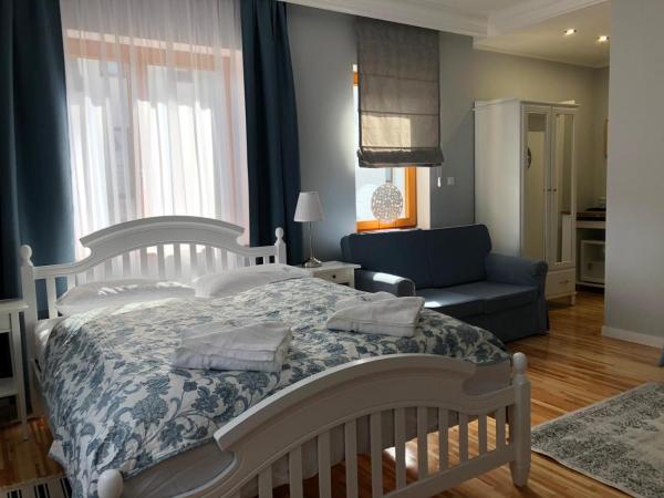 Willa 4 Pory Roku & Uznam : photo 6 de la chambre chambre double deluxe