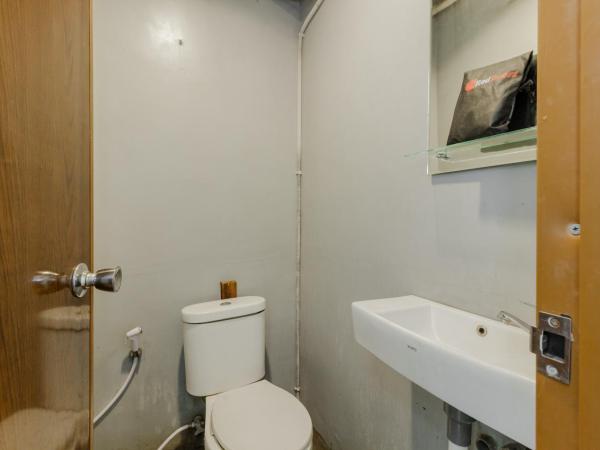 RedDoorz Syariah At Taman Bendungan Asahan : photo 9 de la chambre chambre double