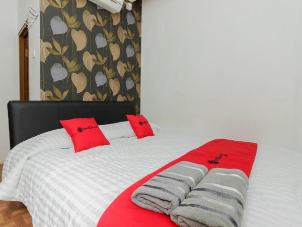 RedDoorz Syariah At Taman Bendungan Asahan : photo 7 de la chambre chambre double
