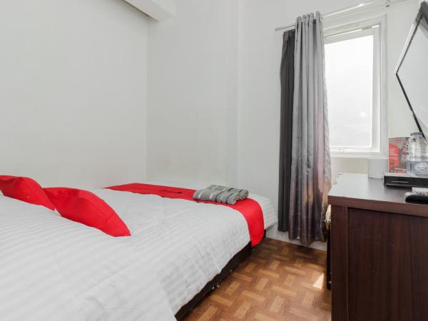 RedDoorz Syariah At Taman Bendungan Asahan : photo 8 de la chambre chambre double