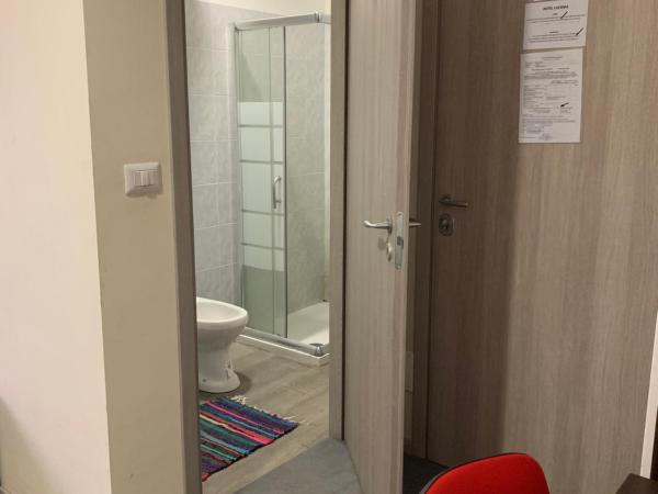 Hotel Lucania : photo 4 de la chambre chambre triple