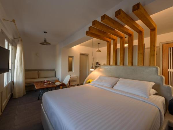 Elitoz Suites : photo 4 de la chambre suite lit king-size avec jacuzzi - vue sur volcan