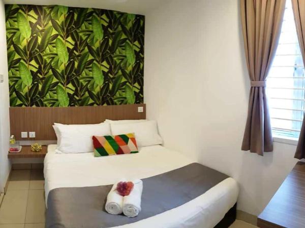 Teruntum 96 Guest house : photo 1 de la chambre chambre lit queen-size deluxe