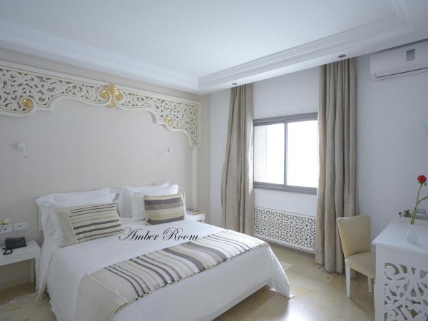 Dar Corniche La Marsa (Adults Only) : photo 1 de la chambre hébergement ambre - vue sur jardin