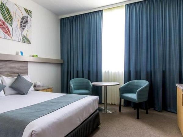 Comfort Inn Regal Park : photo 2 de la chambre chambre exécutive lit queen-size