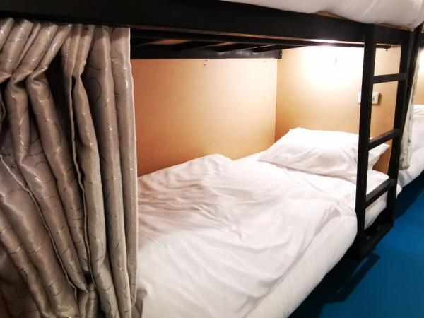 D​ Luck​ Hostel : photo 2 de la chambre lit dans dortoir de 8 lits 