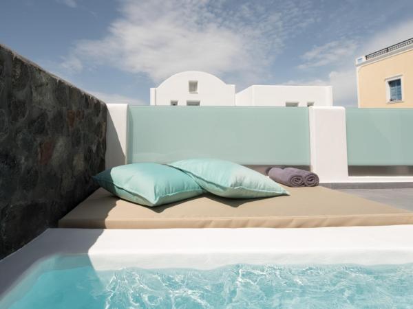 Elitoz Suites : photo 1 de la chambre suite junior avec bain à remous