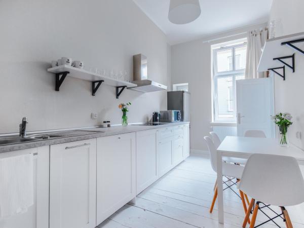 Riviera Residence Apartments : photo 3 de la chambre appartement 4 chambres avec 2 salles de bains