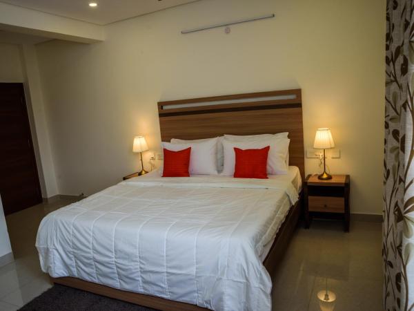 Cloud9Homes Serviced Apartments : photo 1 de la chambre chambre lit king-size supérieure