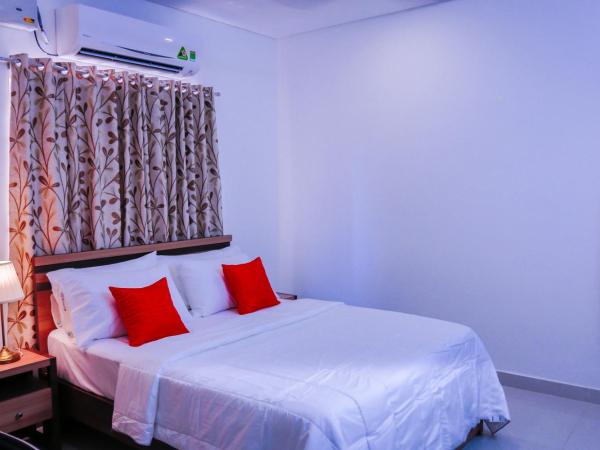 Cloud9Homes Serviced Apartments : photo 4 de la chambre chambre lit queen-size