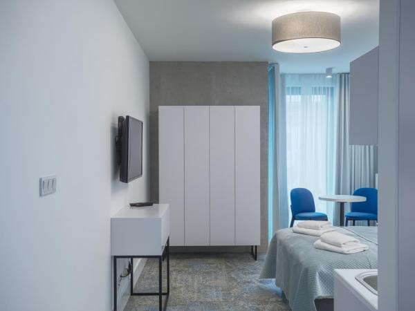 RAJSKA 3 by PI Apartments : photo 5 de la chambre blanc