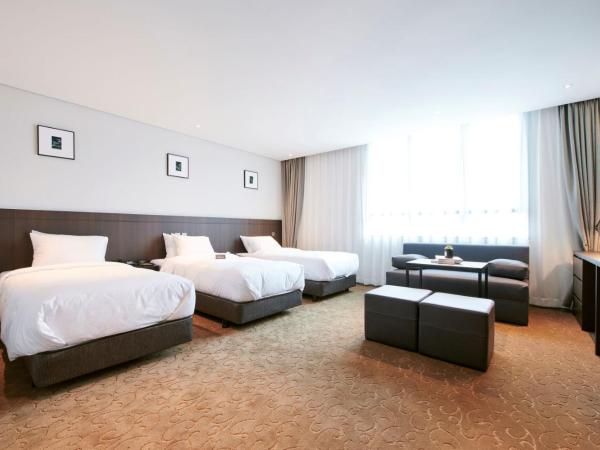 Hotel Mfelice : photo 1 de la chambre chambre triple premium